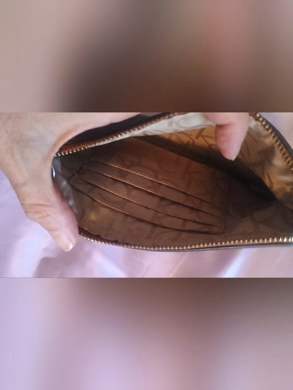 Make An Offer 🫴 Calvin Klein Brown Monogram Wristlet Clutch with Tan Trim